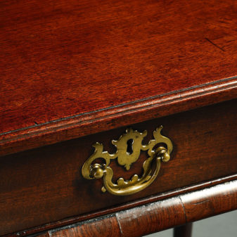 An 18th century george ii period mahogany side table