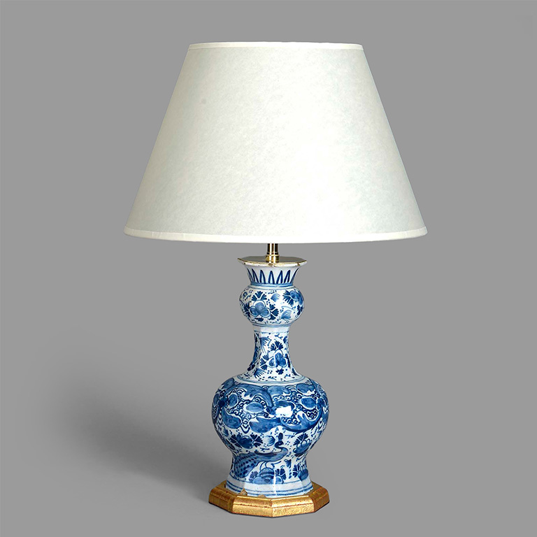 Selection of unique antique lamp bases, chandeliers, candlesticks, wall lights and, lampshades.