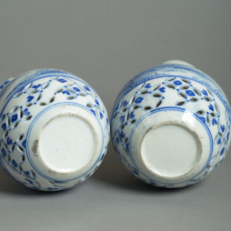 Late 19th century pair of blue & white gourd vases