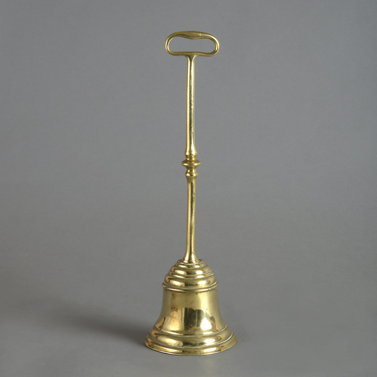 19th century victorian brass bell form doorstop