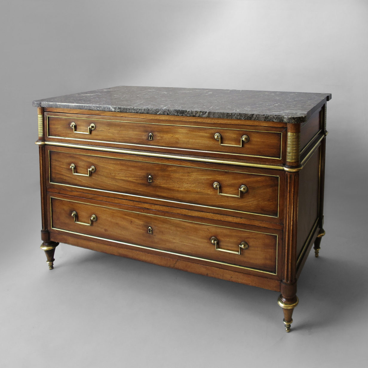 A louis xvi period mahogany commode