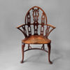 A gothic windsor yew wood armchair