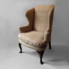 A george i period walnut wing armchair