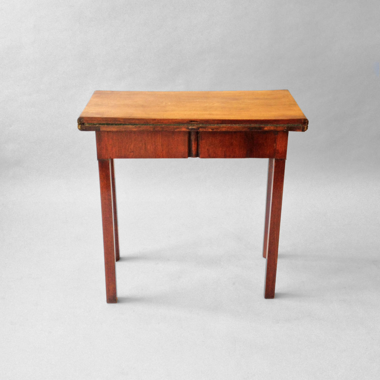 A pair of george ii small mahogany card tables