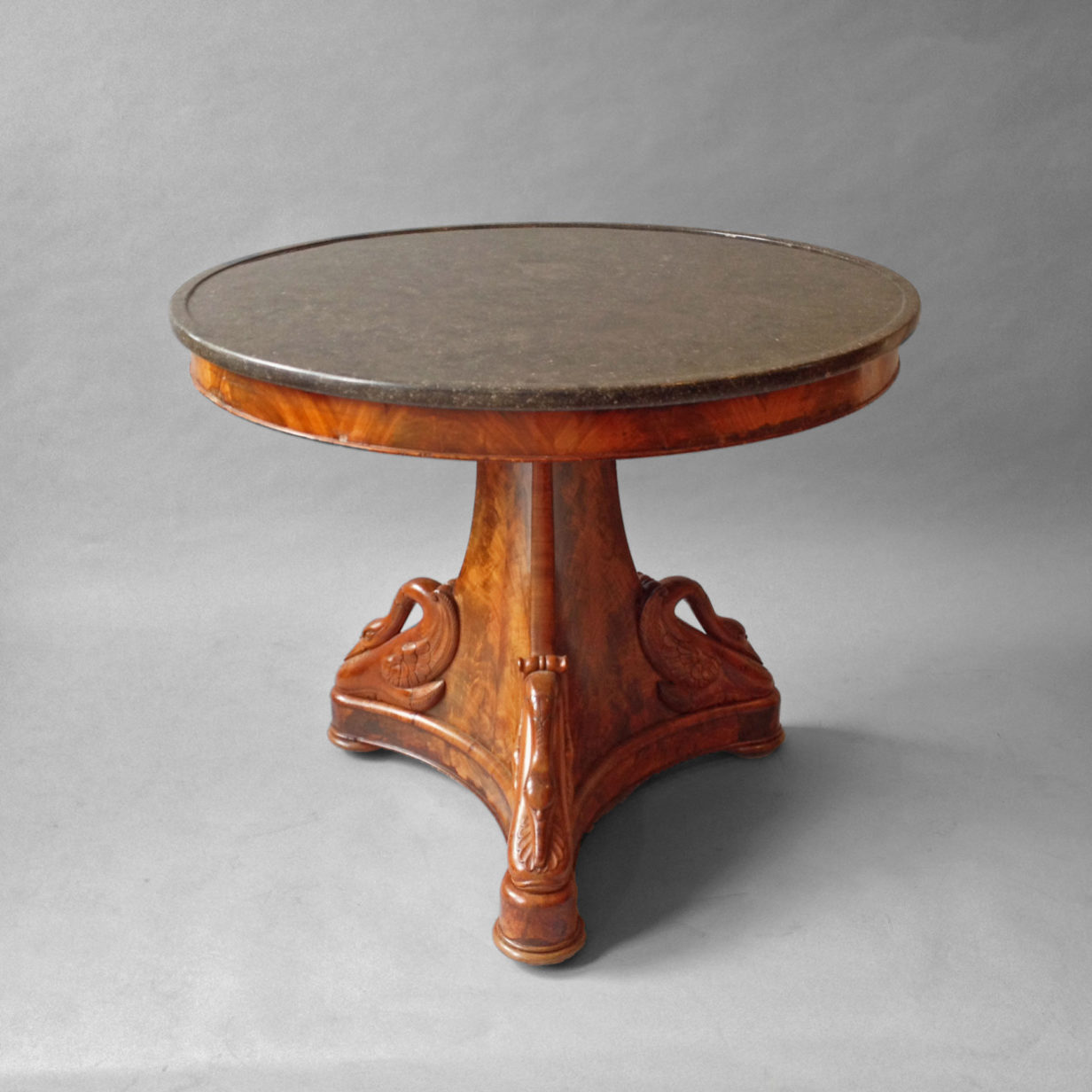 An early 19th century empire period mahogany gueridon