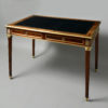 A 19th century louis xvi style mahogany writing table