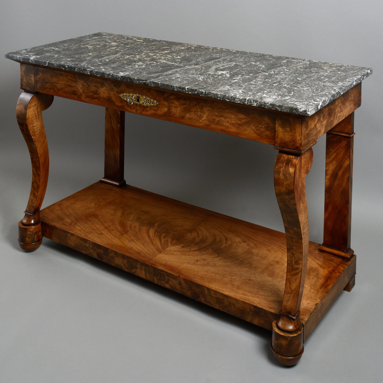 An early 19th century empire period console table