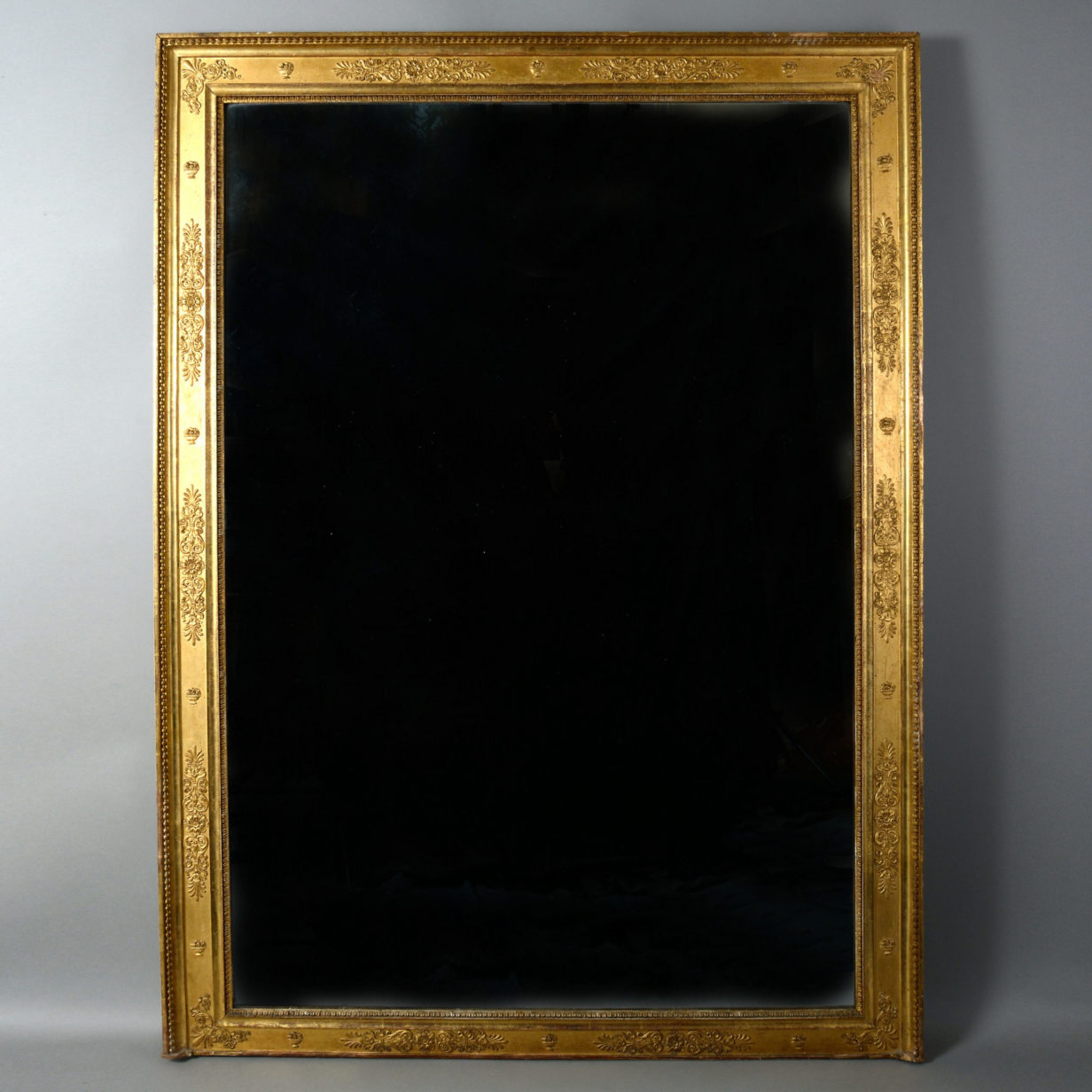 A 19th century empire period overmantel mirror