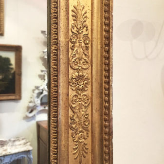 A 19th century empire period overmantel mirror