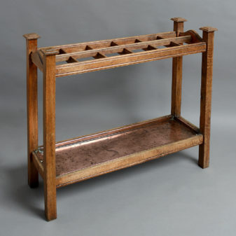 A pair of 19th century oak club stick stands