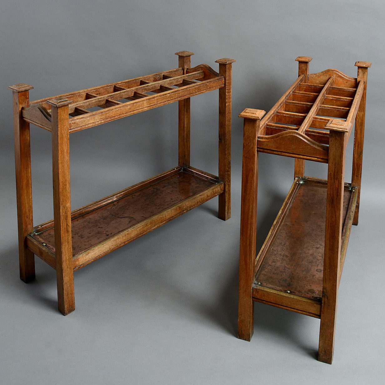 A pair of 19th century oak club stick stands