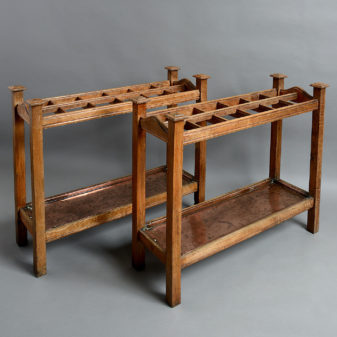 A pair of 19th century oak club stick stands