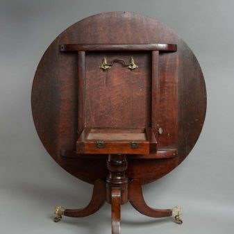 A regency period mahogany breakfast table