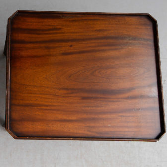 A pair of mahogany end tables