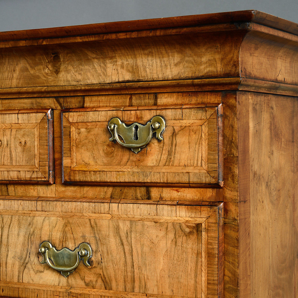 An early 18th century george ii period walnut chest on chest