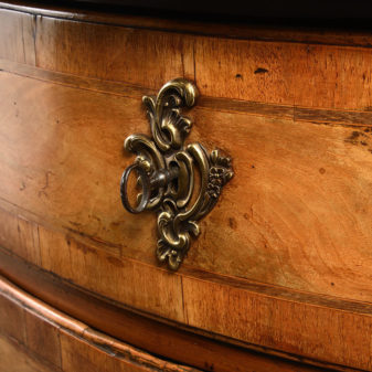 An 18th century louis xv period walnut serpentine chest of drawers or commode