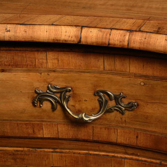 An 18th century louis xv period walnut serpentine chest of drawers or commode