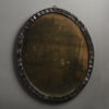 An irish oval border glass mirror