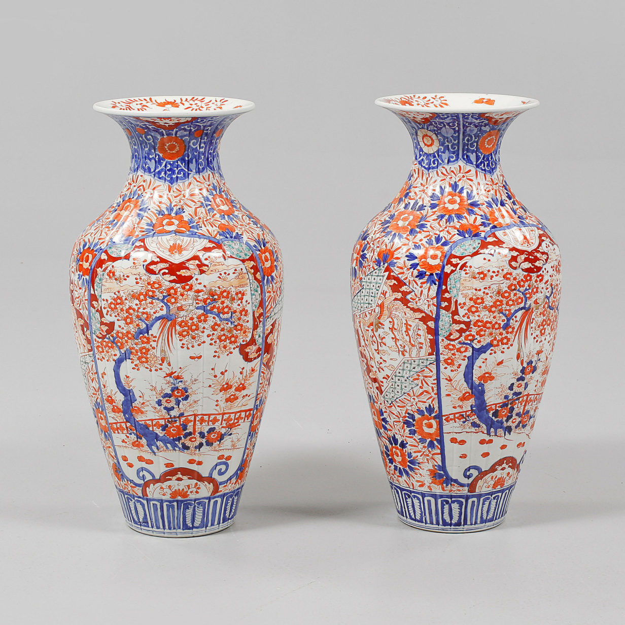 A large pair of 19th century imari vases