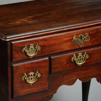 A mid-18th century george ii period mayhogany lowboy