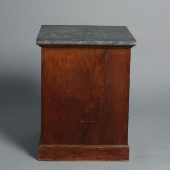 An early 19th century empire period bedside cabinet