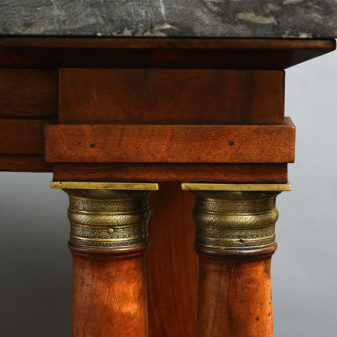 An early 19th century empire period walnut console table