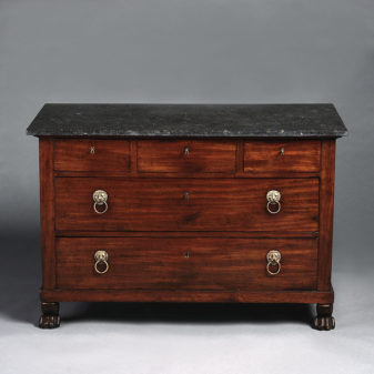 A 19th century empire period mahogany commode