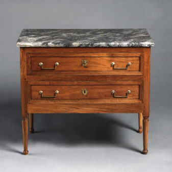 A late 18th century louis xvi period walnut commode