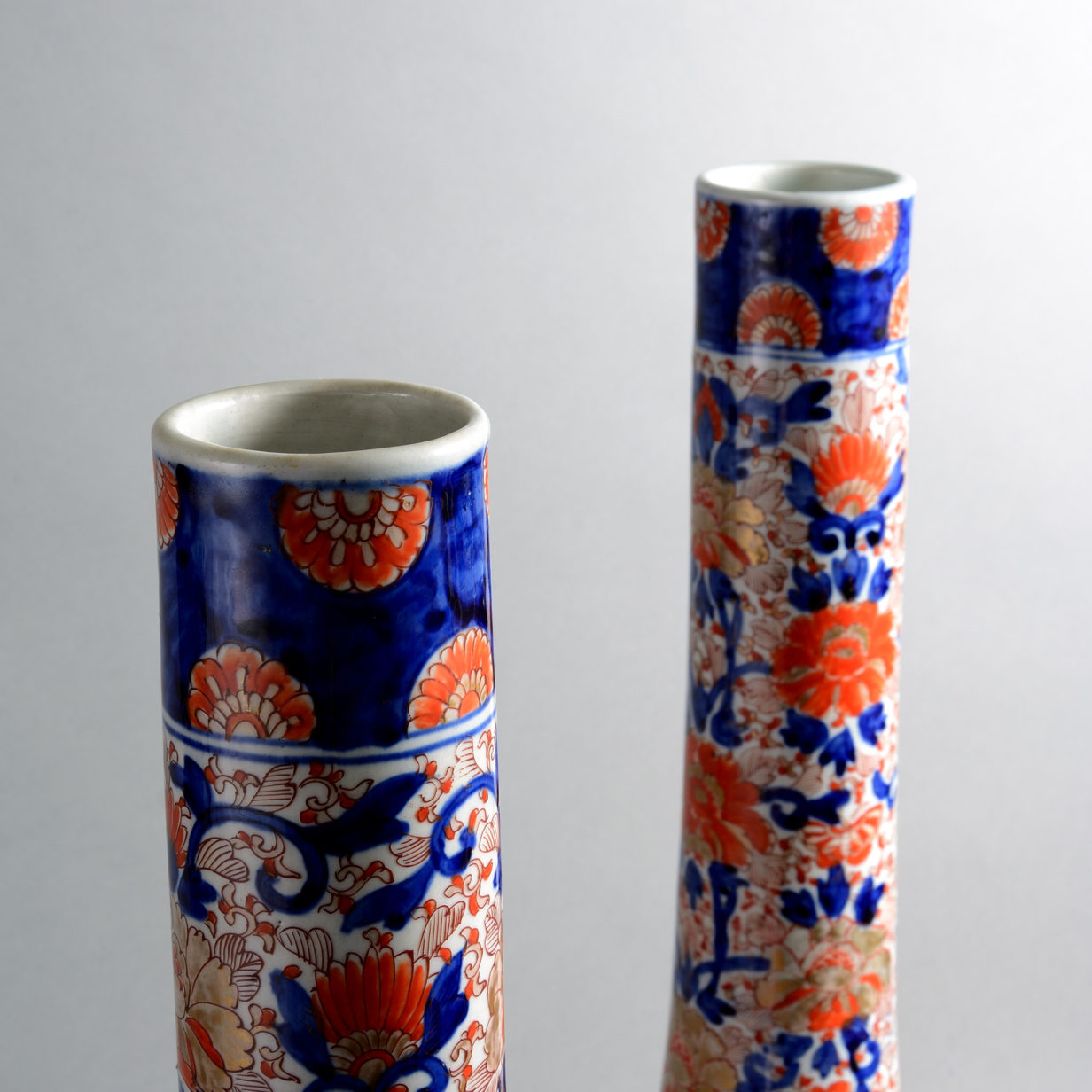 A tall pair of 19th century imari bottle vases