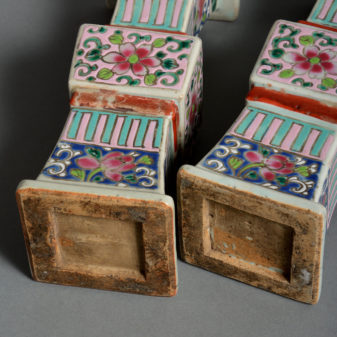 A pair of late 18th century famille rose beaker vases