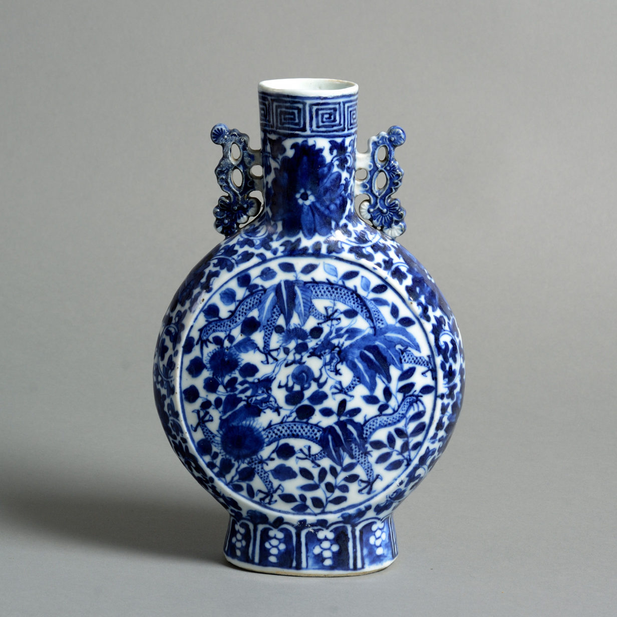 A 19th century blue and white porcelain moon flask