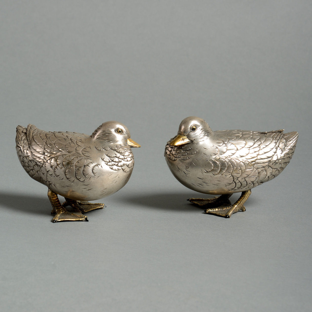 A pair of 19th century silver gilt ducks