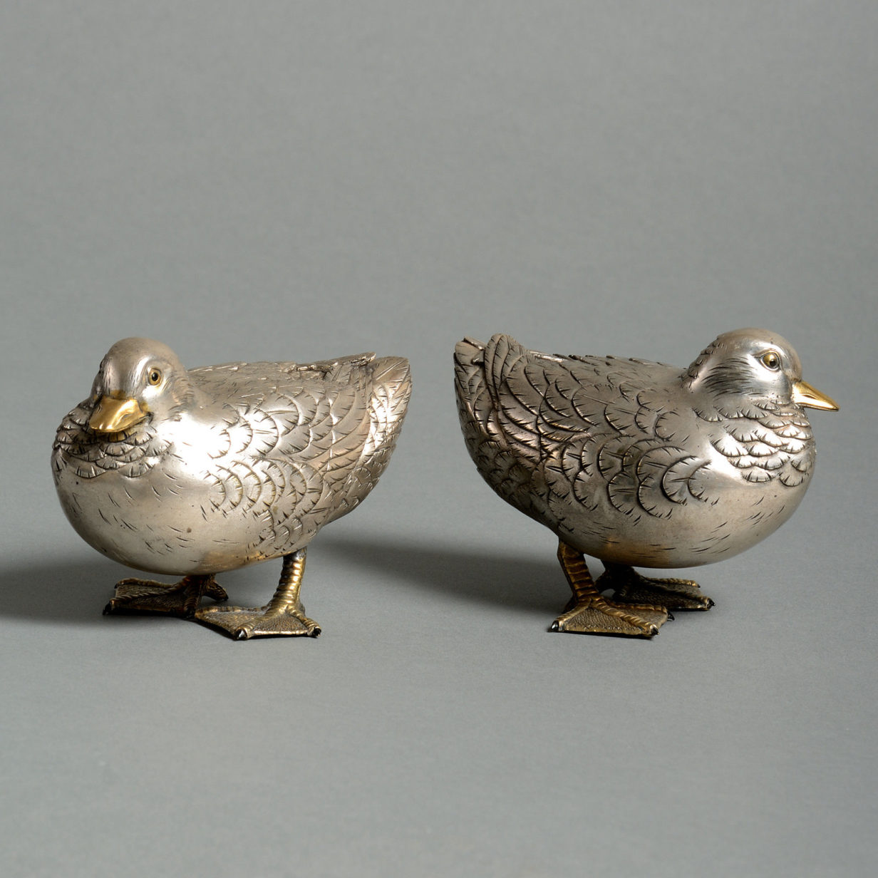 A pair of 19th century silver gilt ducks