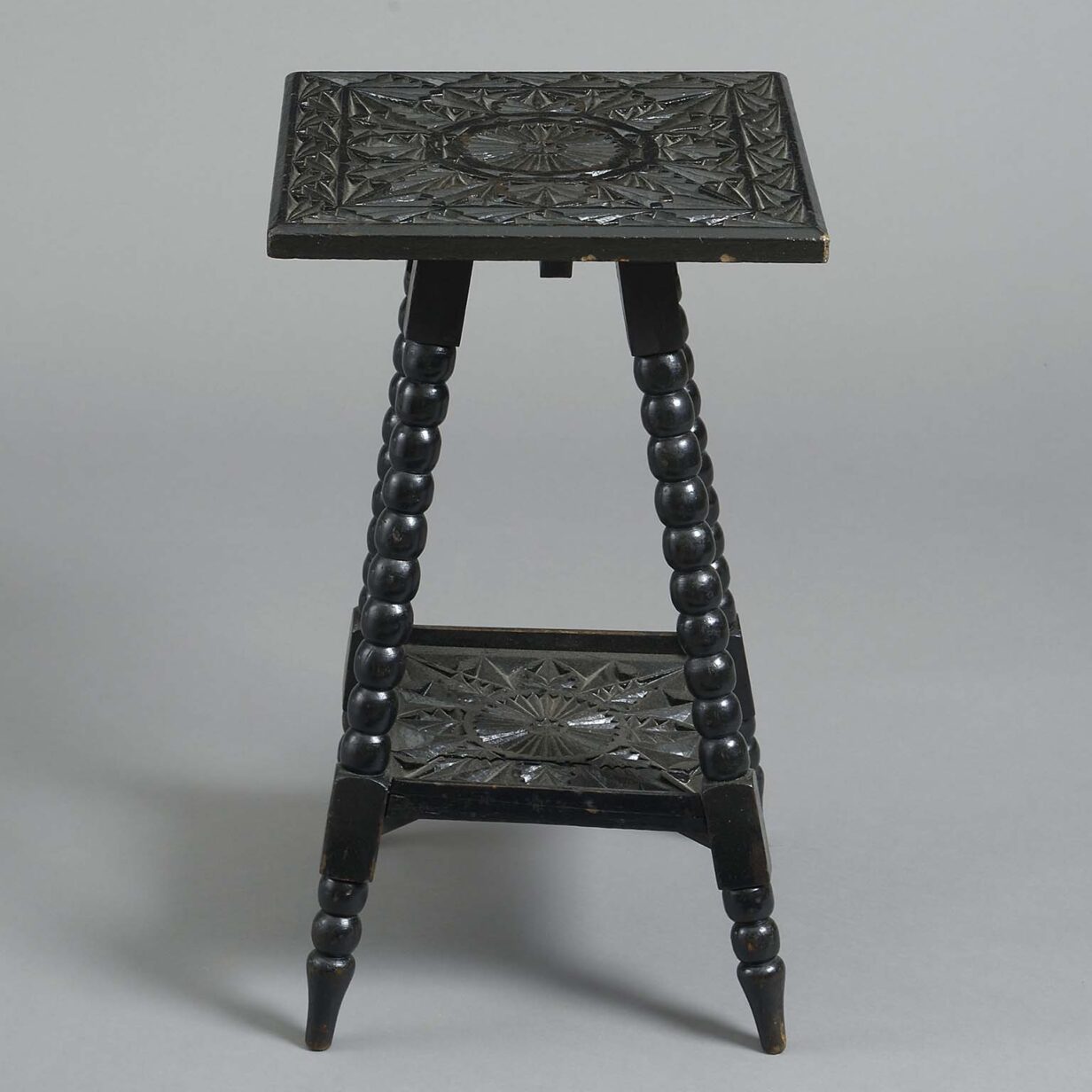 Ebonised occasional table