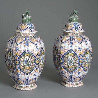 Pair of polychrome vases and covers