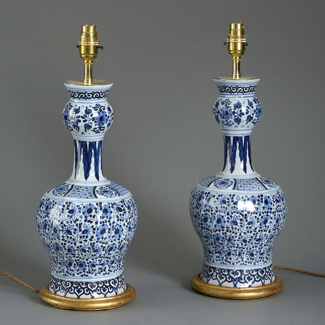 Pair of garlic neck blue and white delft pottery vase lamps