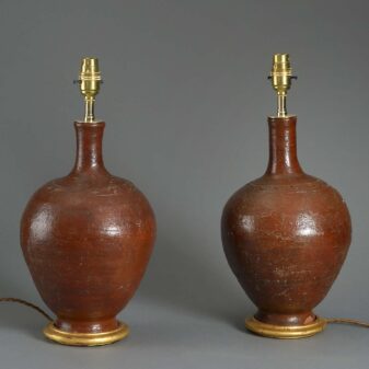 Pair of red glazed bottle jar lamps