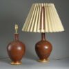 Pair of red glazed bottle jar lamps