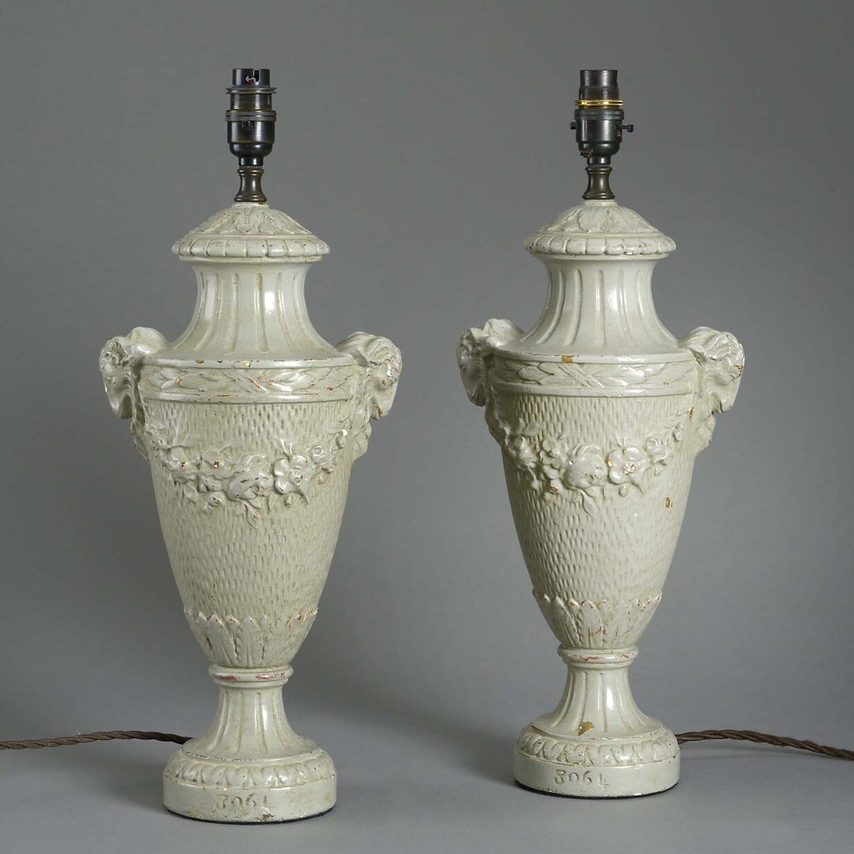 Pair of antique painted wooden lamps