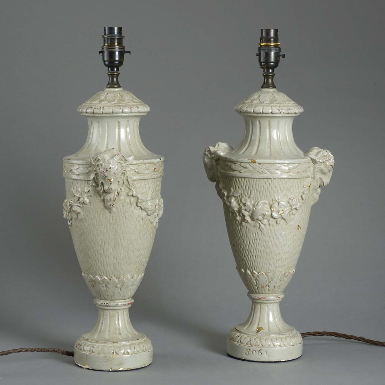 Pair of antique painted wooden lamps