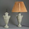 Pair of antique painted wooden lamps