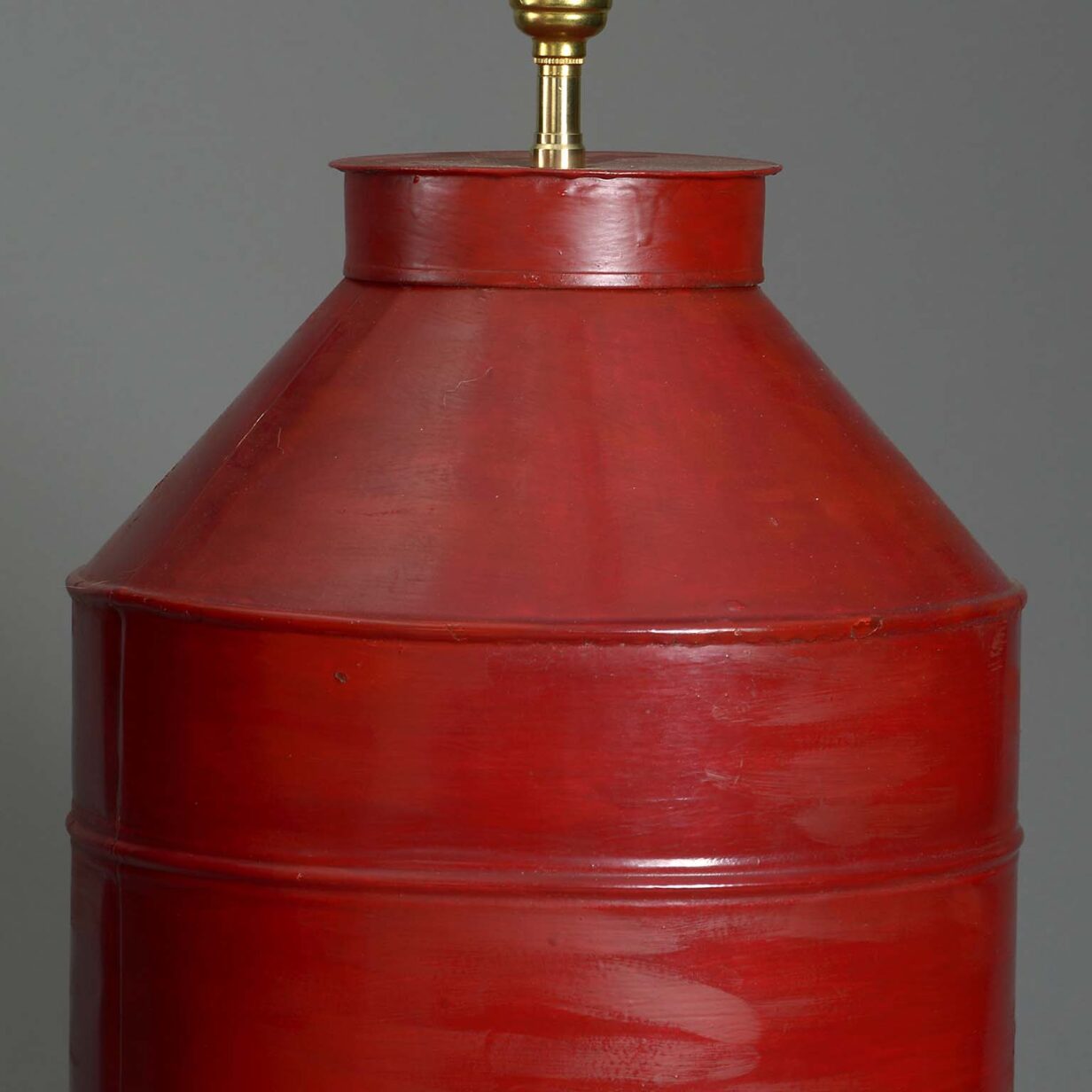 Pair of red tole canister lamps