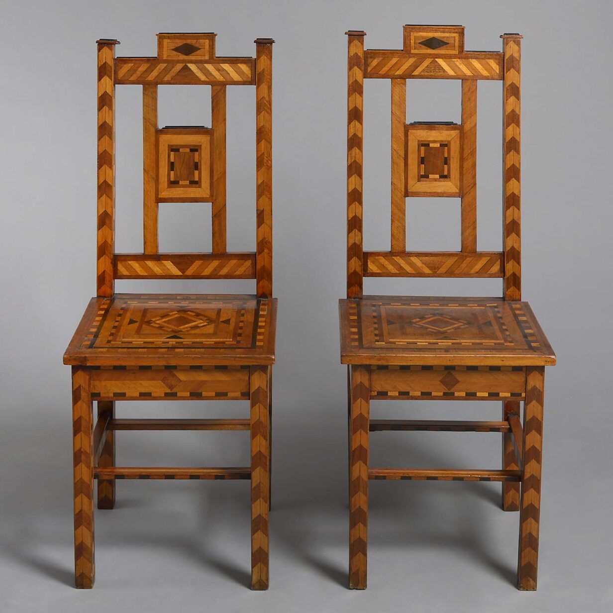 Pair of parquetry hall chairs