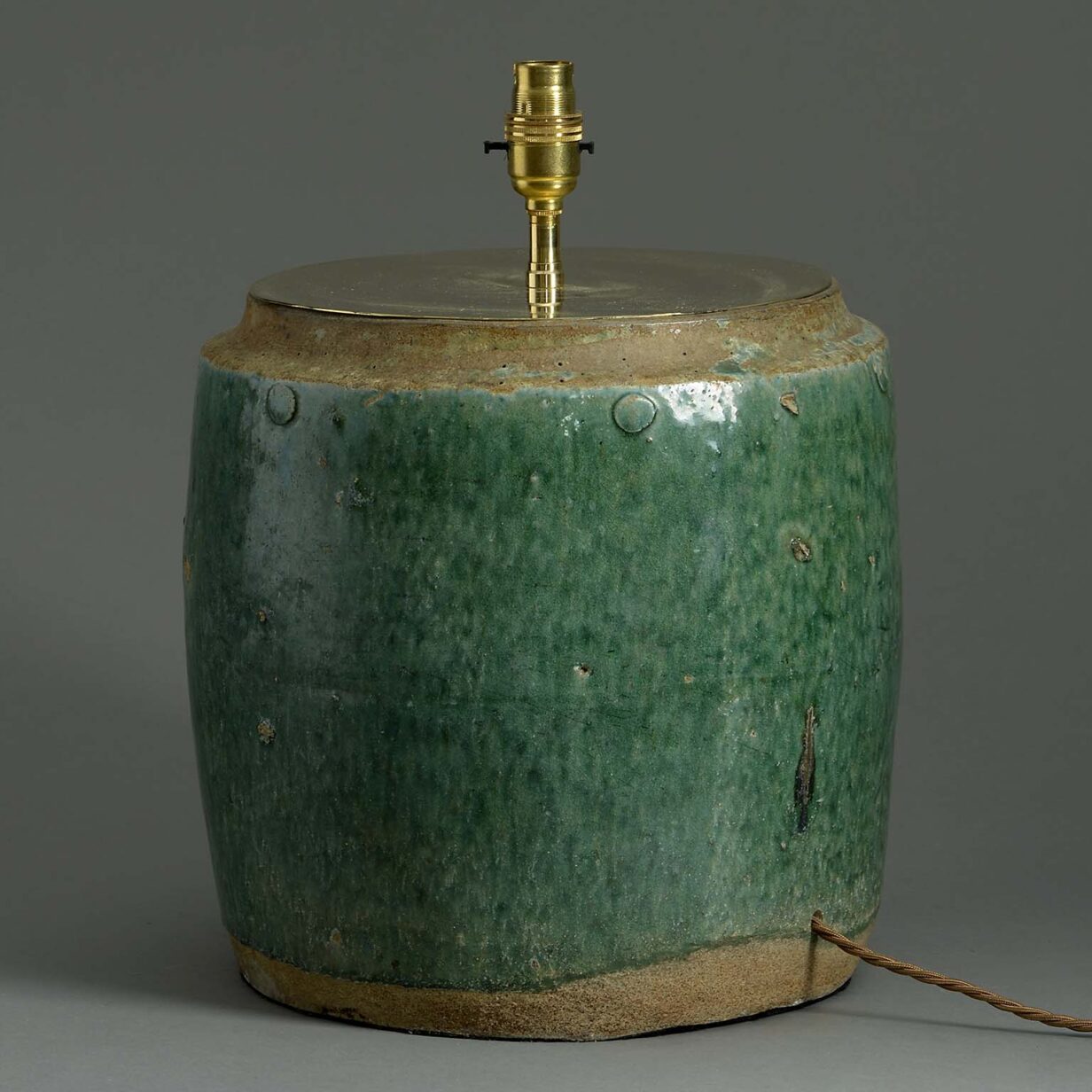 Early 20th century pine green pottery jar lamp