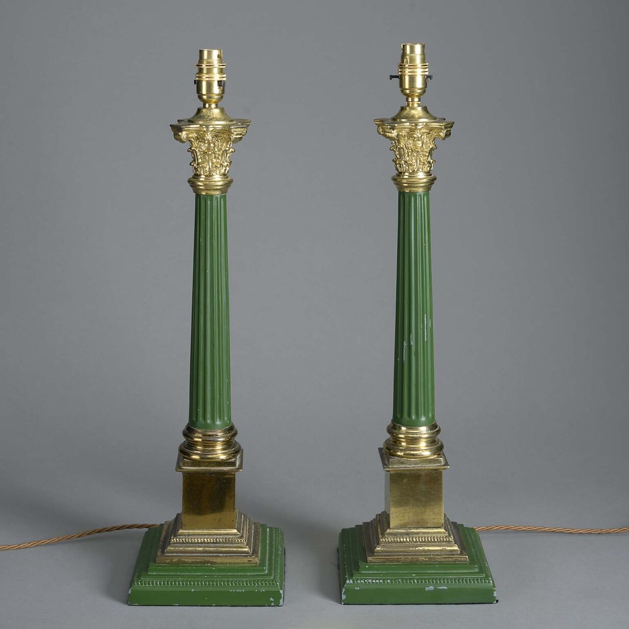 Pair of 19th century green tole and gilt brass column lamps