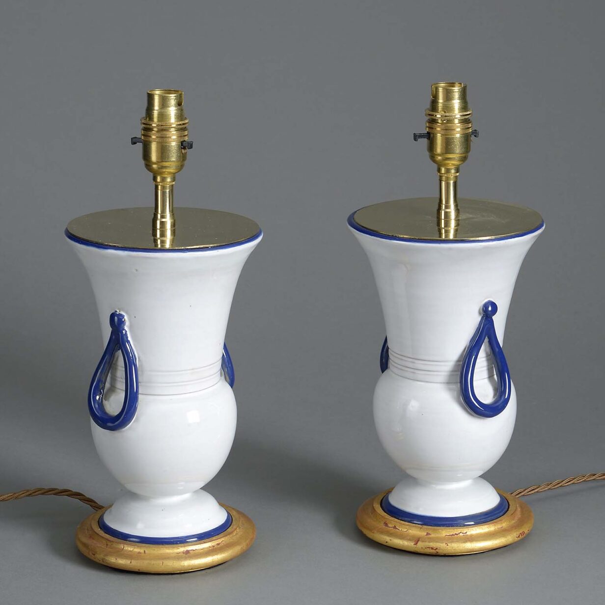 Pair of cream and bue glazed vase lamps