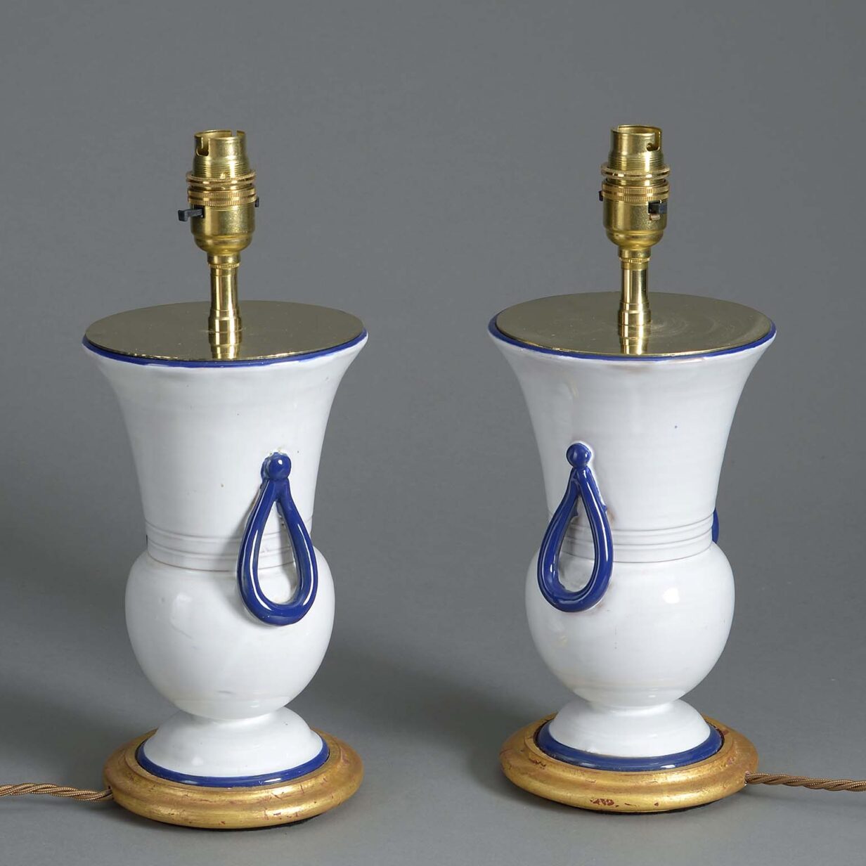 Pair of cream and bue glazed vase lamps