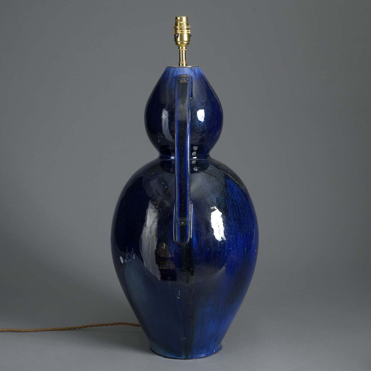 Tall 20th century two-handled blue glazed vase lamp