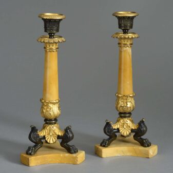 Pair of siena marble candlesticks