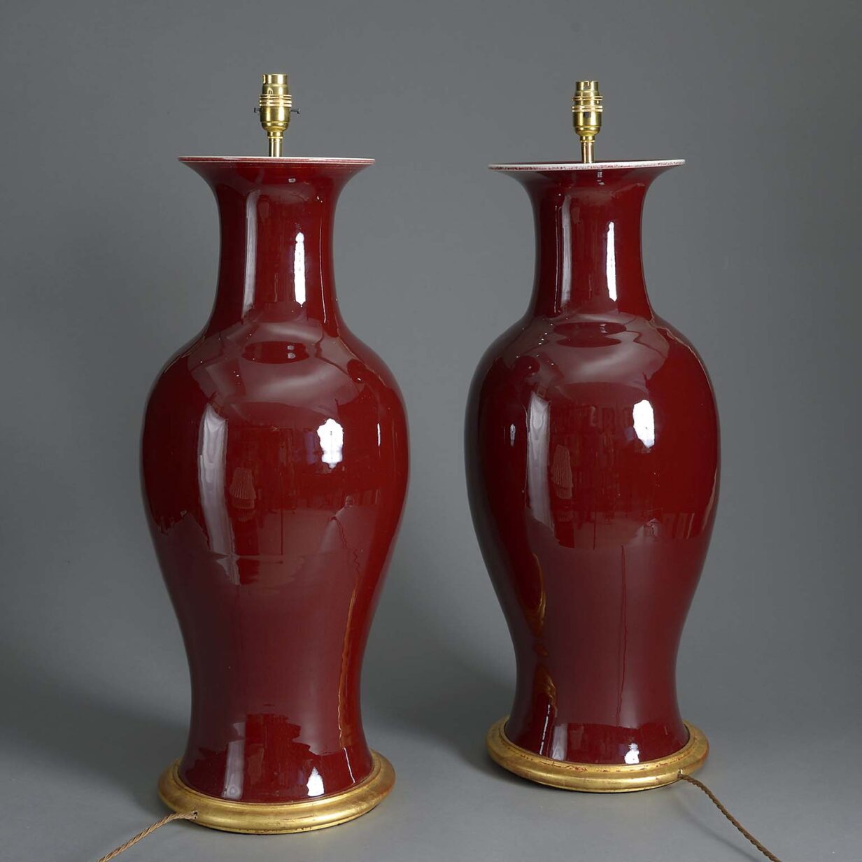 Pair of sang de boeuf vase lamps